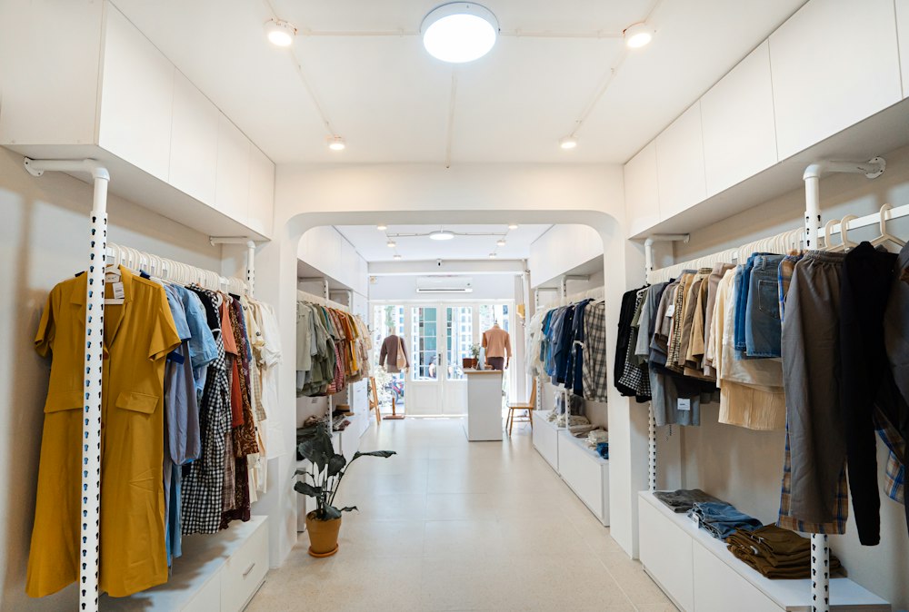 Bright clothing boutique with carefully organised product displays